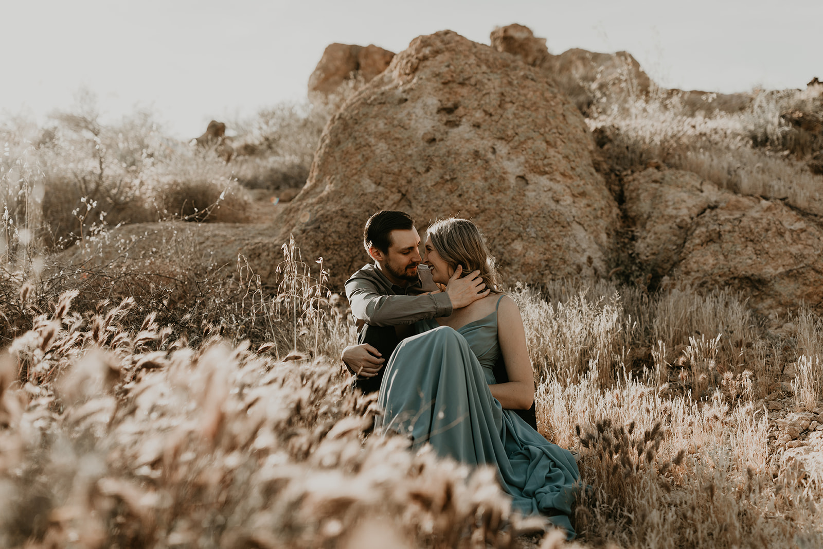 beautiful couple share an intimate moment in the Arizona nature