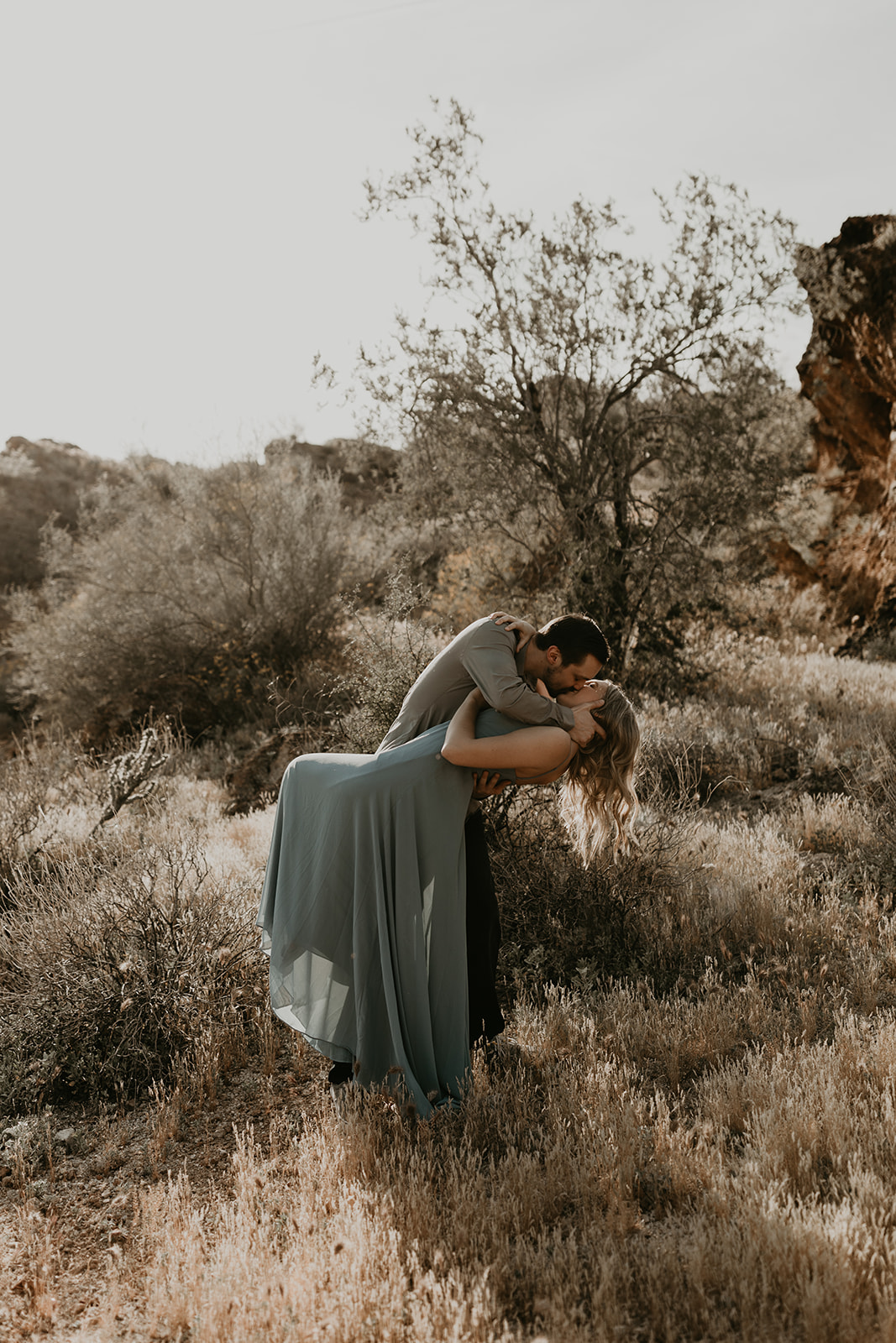 beautiful couple share an intimate moment in the Arizona nature