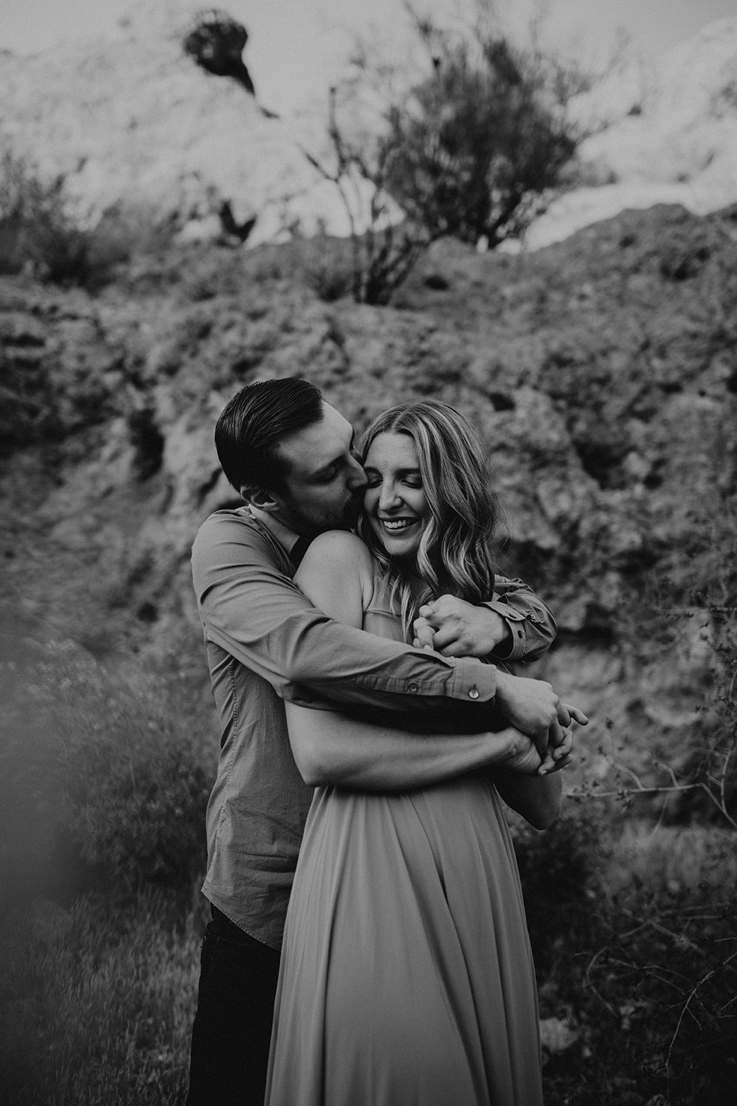 stunning couple pose together in Arizona during their dreamy Canyon Lake engagement photoshoot