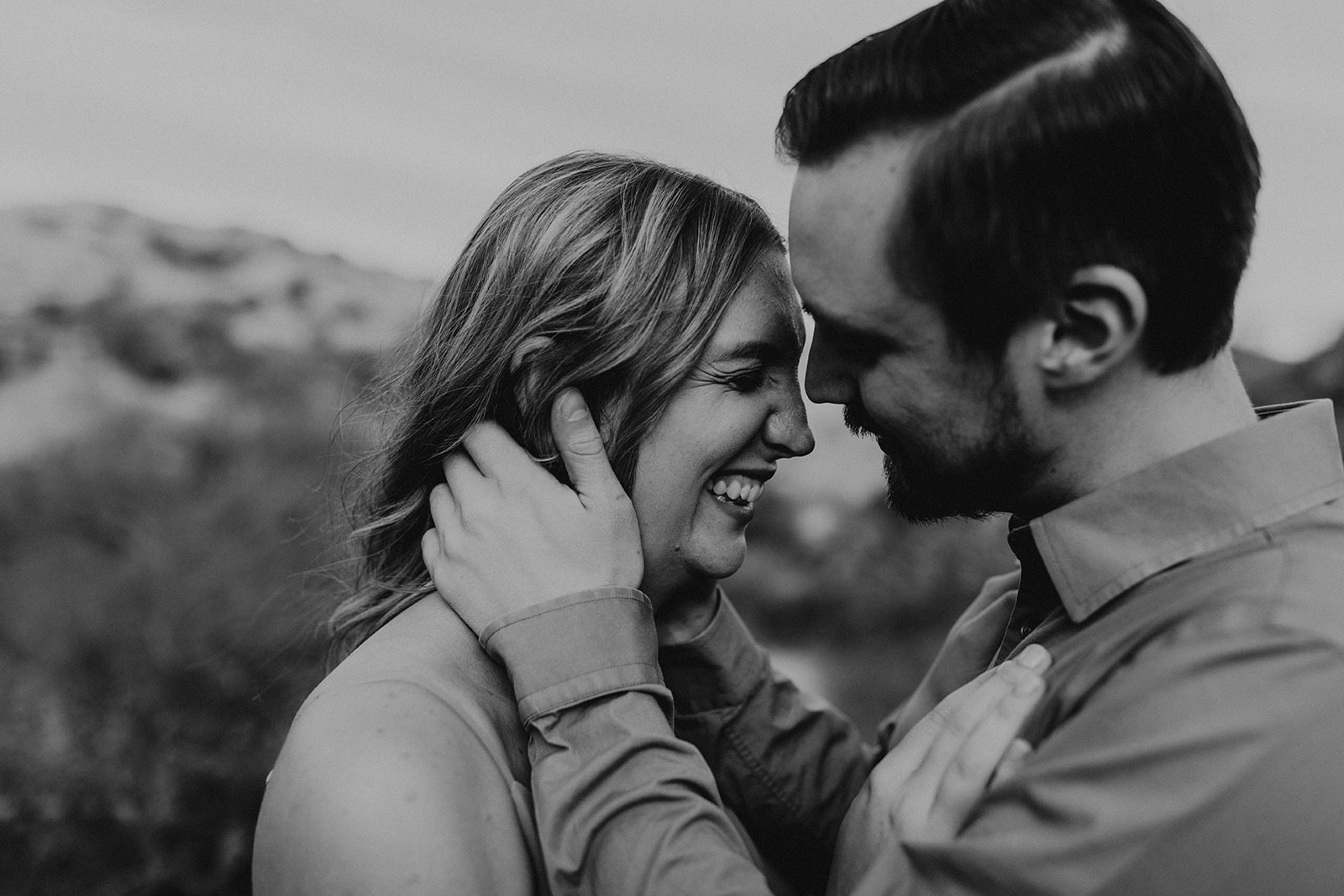 beautiful couple share an intimate moment in the Arizona nature