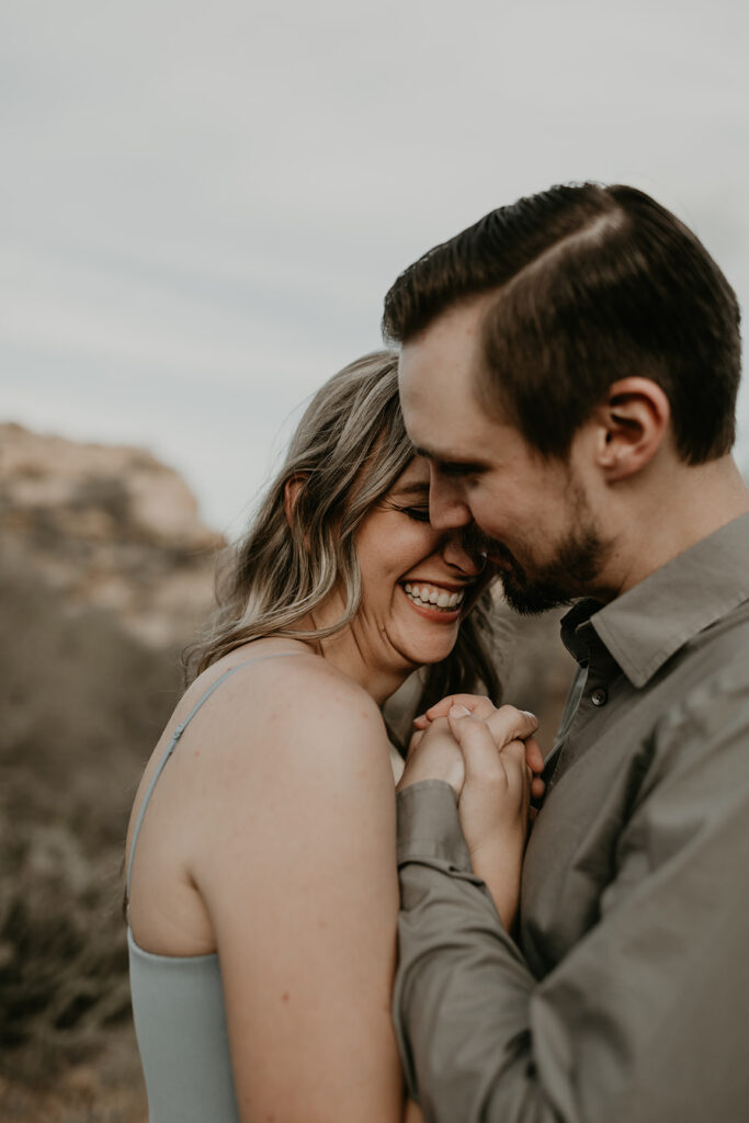 beautiful couple share an intimate moment in the Arizona nature