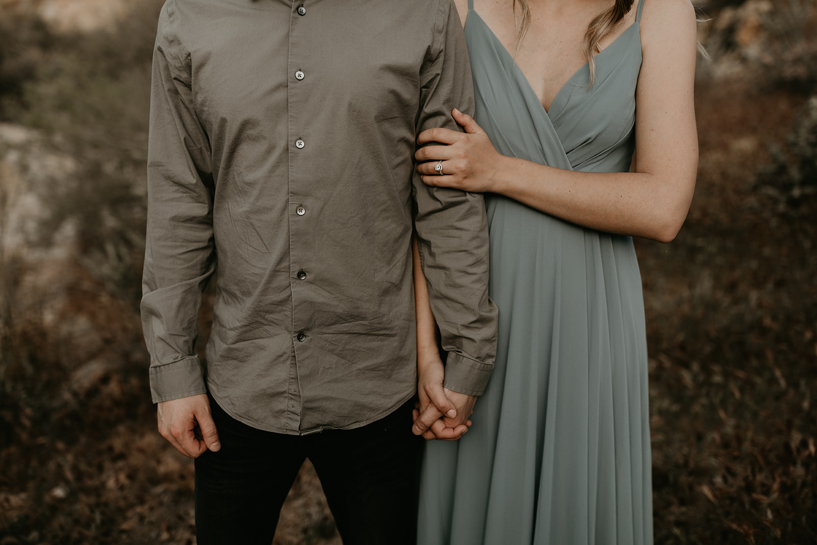 couple pose together during their Arizona engagement photo session