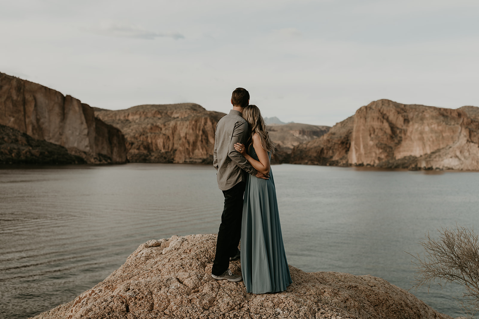 stunning couple pose together in Arizona during their dreamy Canyon Lake engagement photoshoot