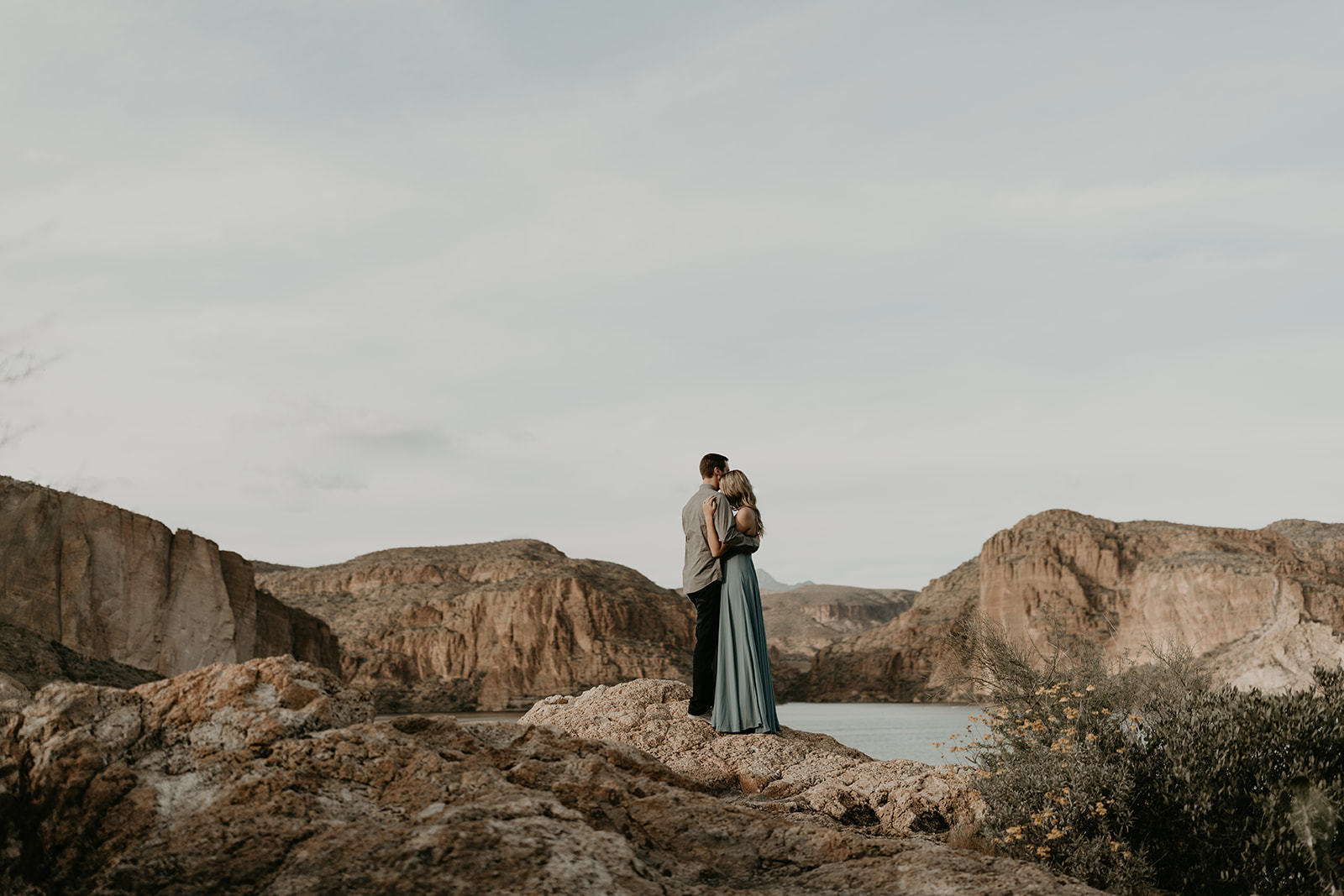 stunning couple pose together in Arizona during their dreamy Canyon Lake engagement photoshoot