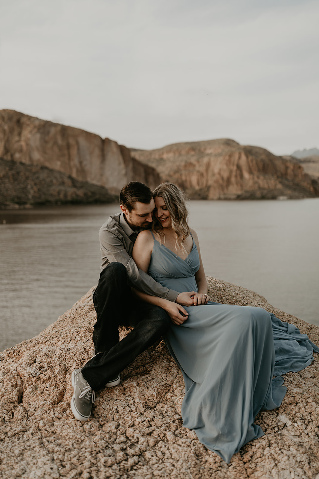 stunning couple pose together in Arizona during their dreamy Canyon Lake engagement photoshoot