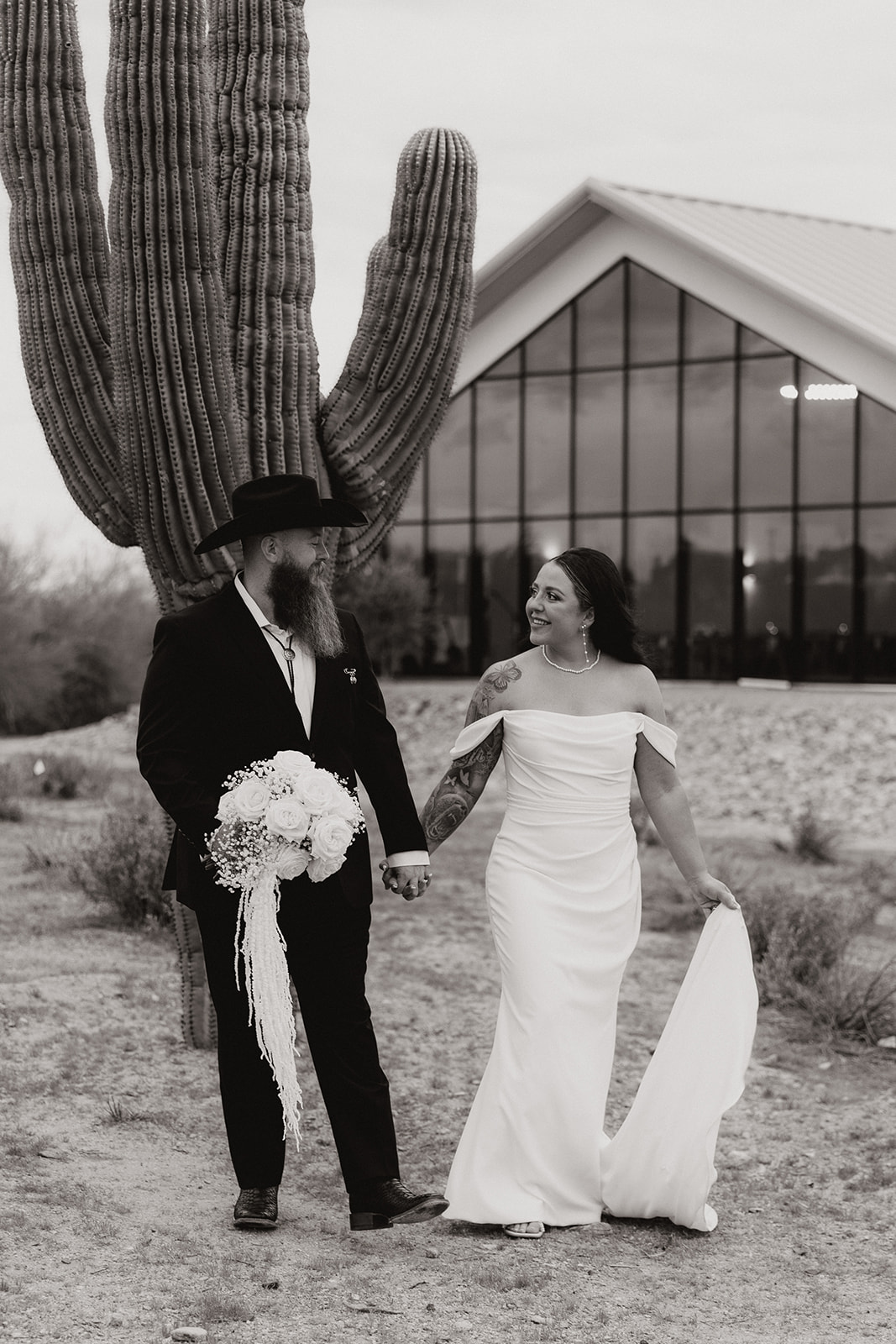 stunning bride and groom pose for a photo after their Apache Junction wedding ceremony