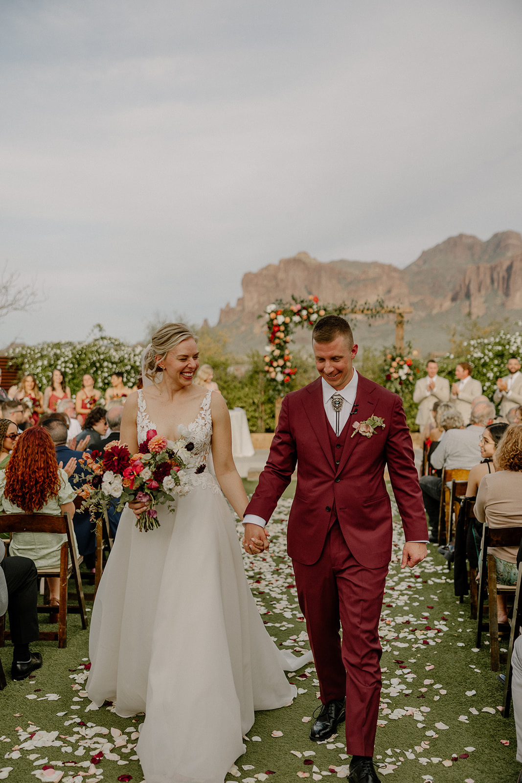 stunning bride and groom pose for a photo after their Apache Junction wedding ceremony