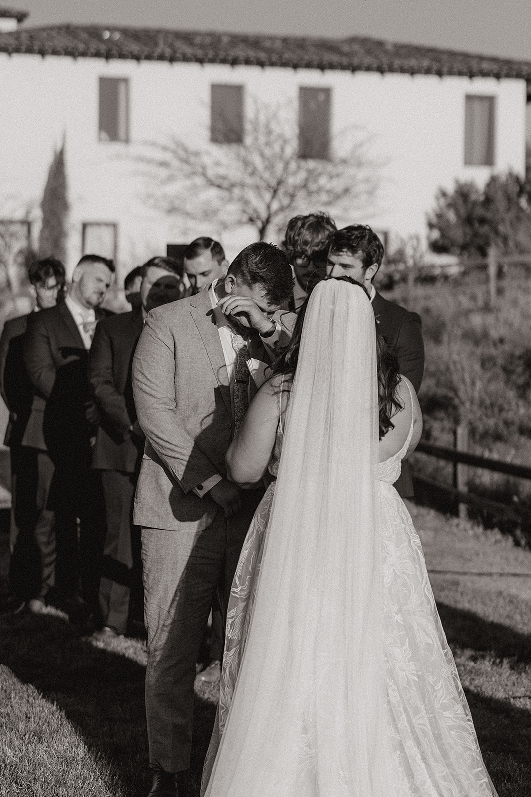 bride and groom share intimate moments during their candid wedding  ceremony