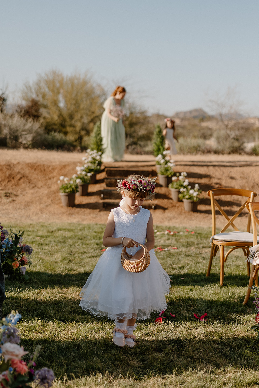 flower girl distrupites flowers on her way down the aisle