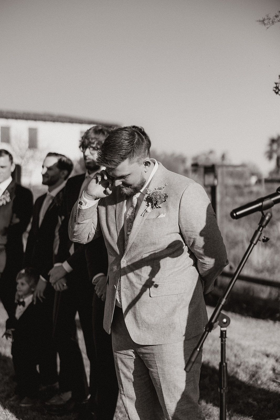 groom cries as his bride enters the stunning Arizona wedding 