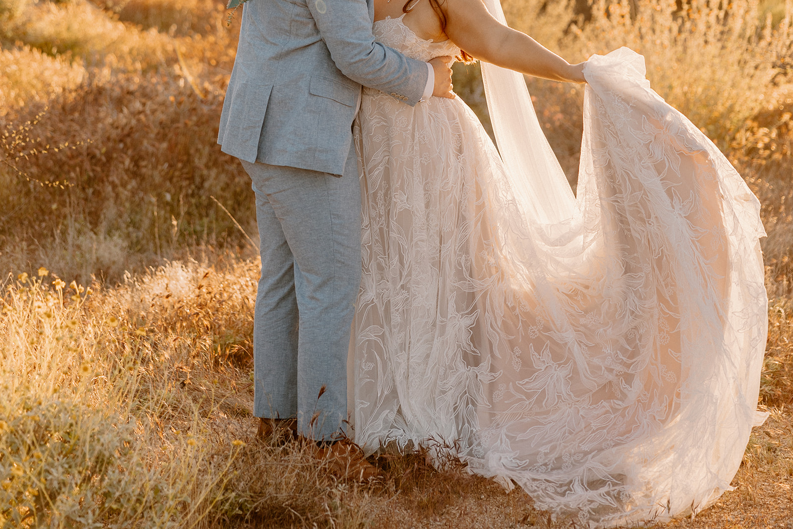 bride and groom pose during golden hour in the beautiful Arizona nature 