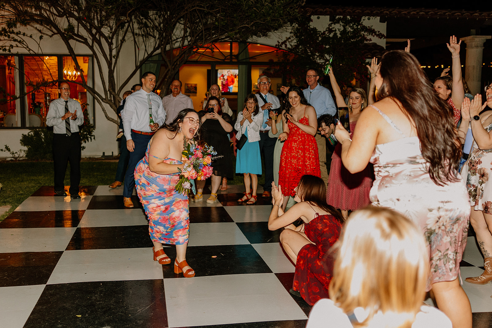 candid wedding reception photos of a backyard Arizona wedding 