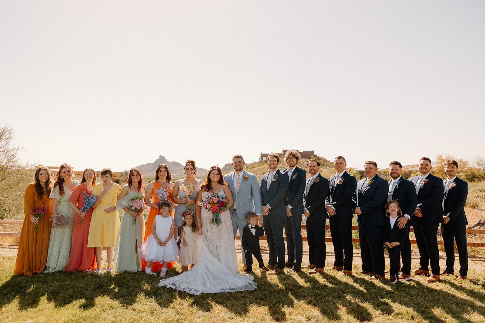 wedding party poses together after the dreamy Arizona wedding