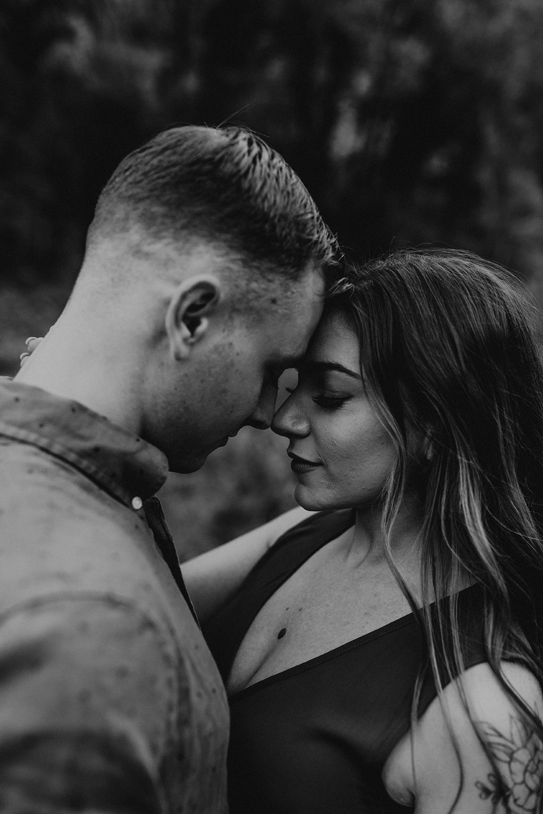 stunning couple share an intimate moment during their West Fork Trail Arizona engagement photo session