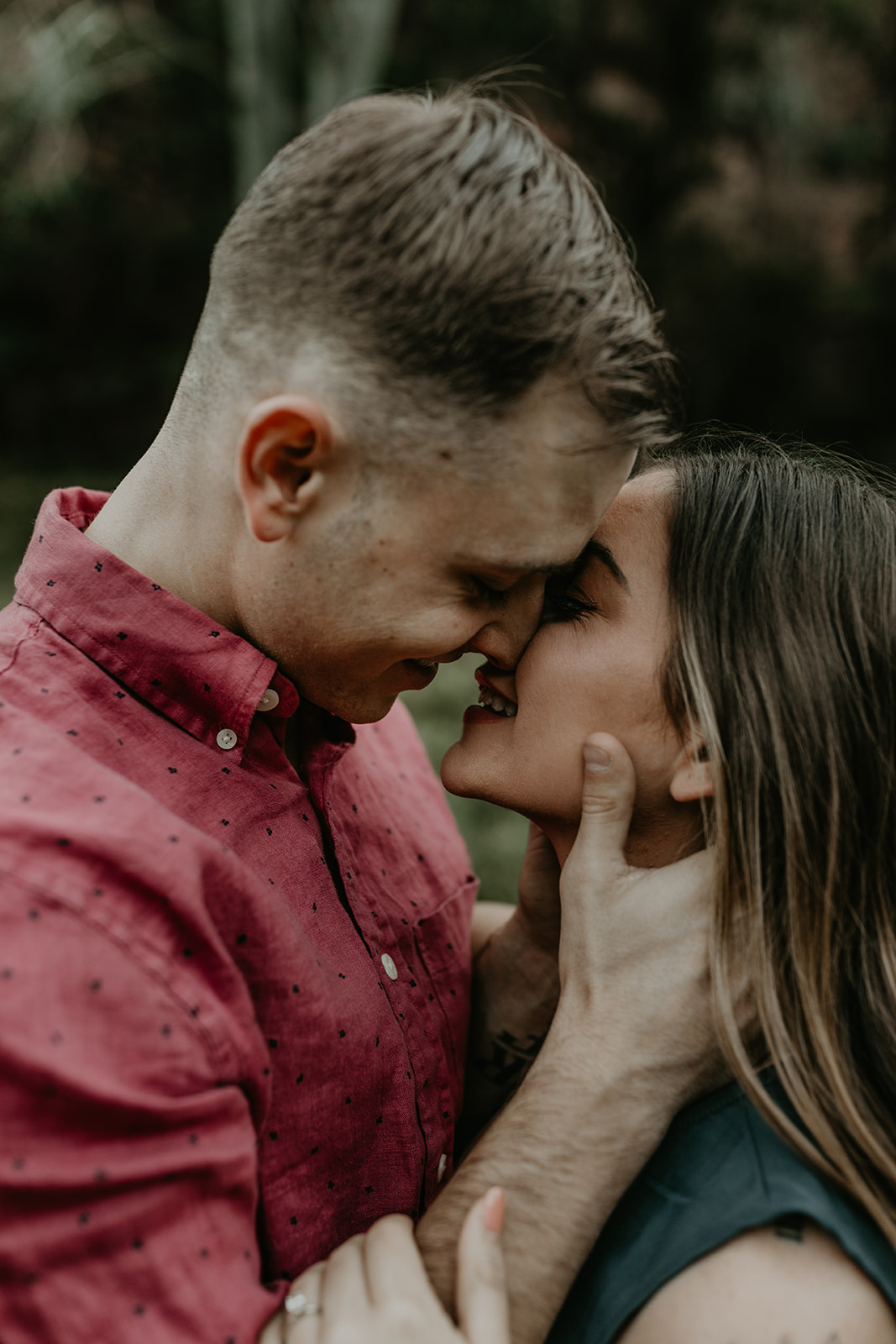 stunning couple share an intimate moment during their West Fork Trail Arizona engagement photo session