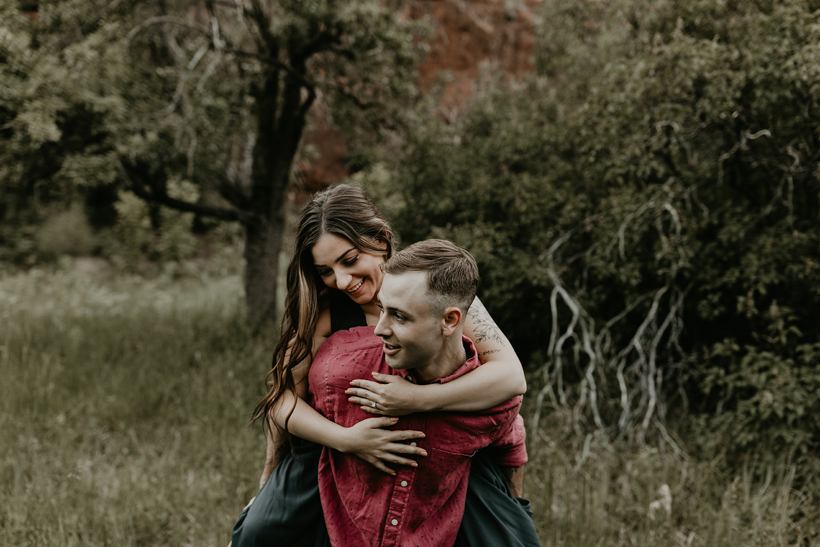 stunning couple share an intimate moment during their West Fork Trail Arizona engagement photo session