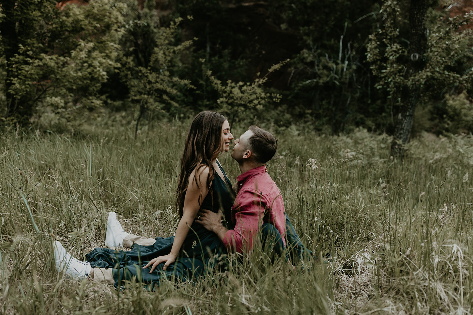 stunning couple share an intimate moment during their West Fork Trail Arizona engagement photo session