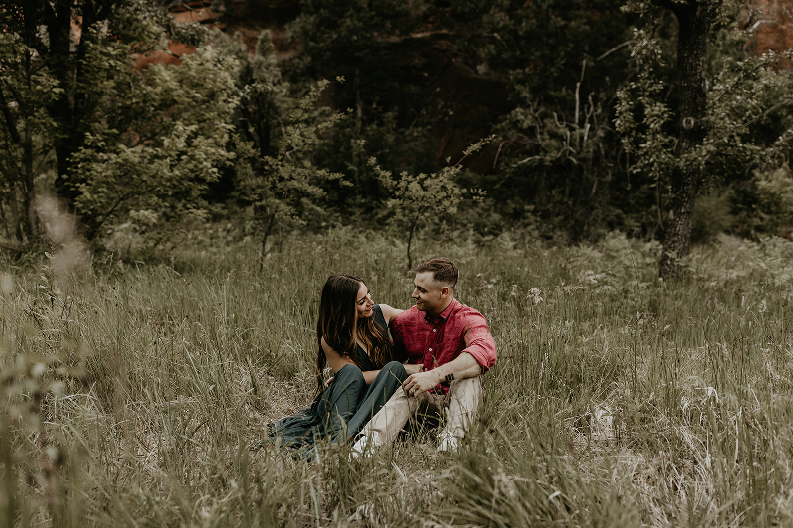 beautiful couple pose in the Arizona nature during their West Fork Trail engagement photoshoot