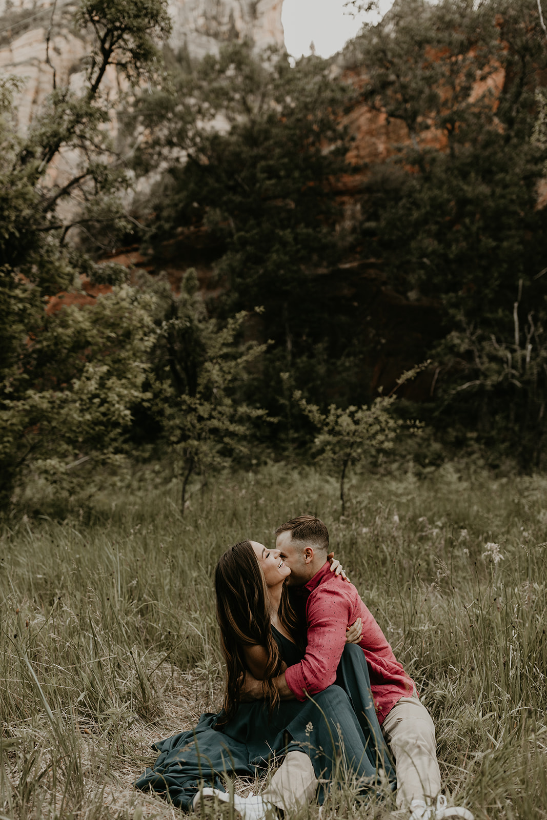 stunning couple share an intimate moment during their West Fork Trail Arizona engagement photo session