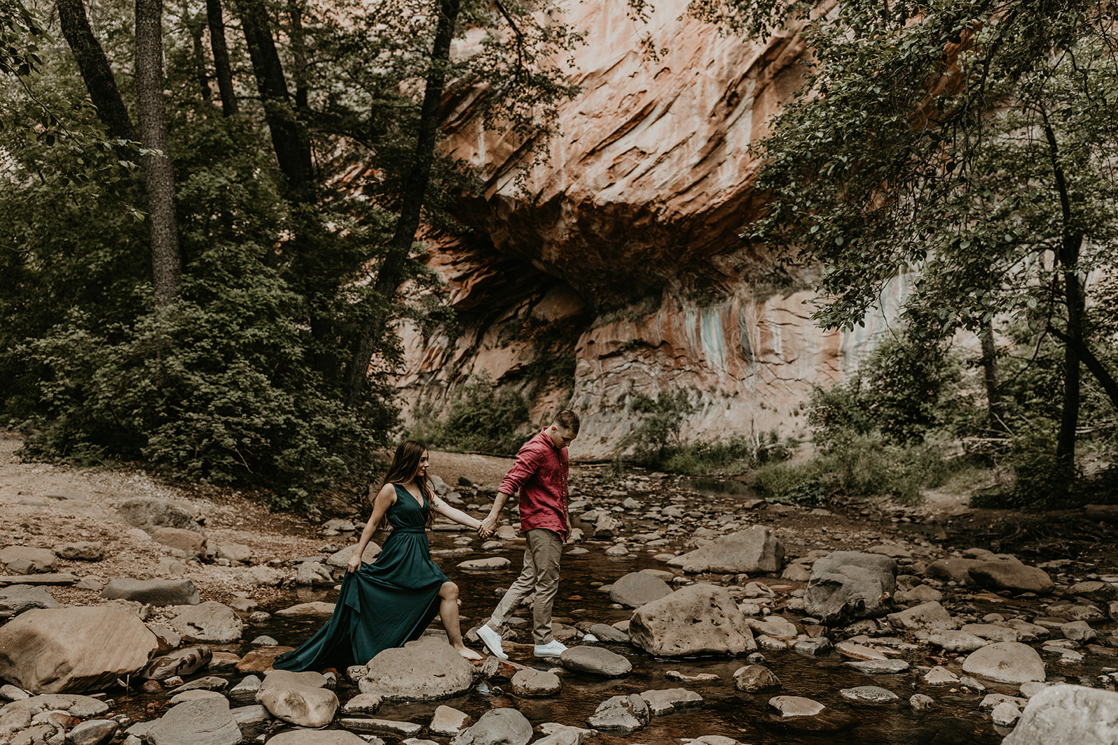 beautiful couple pose with the Arizona nature in the background