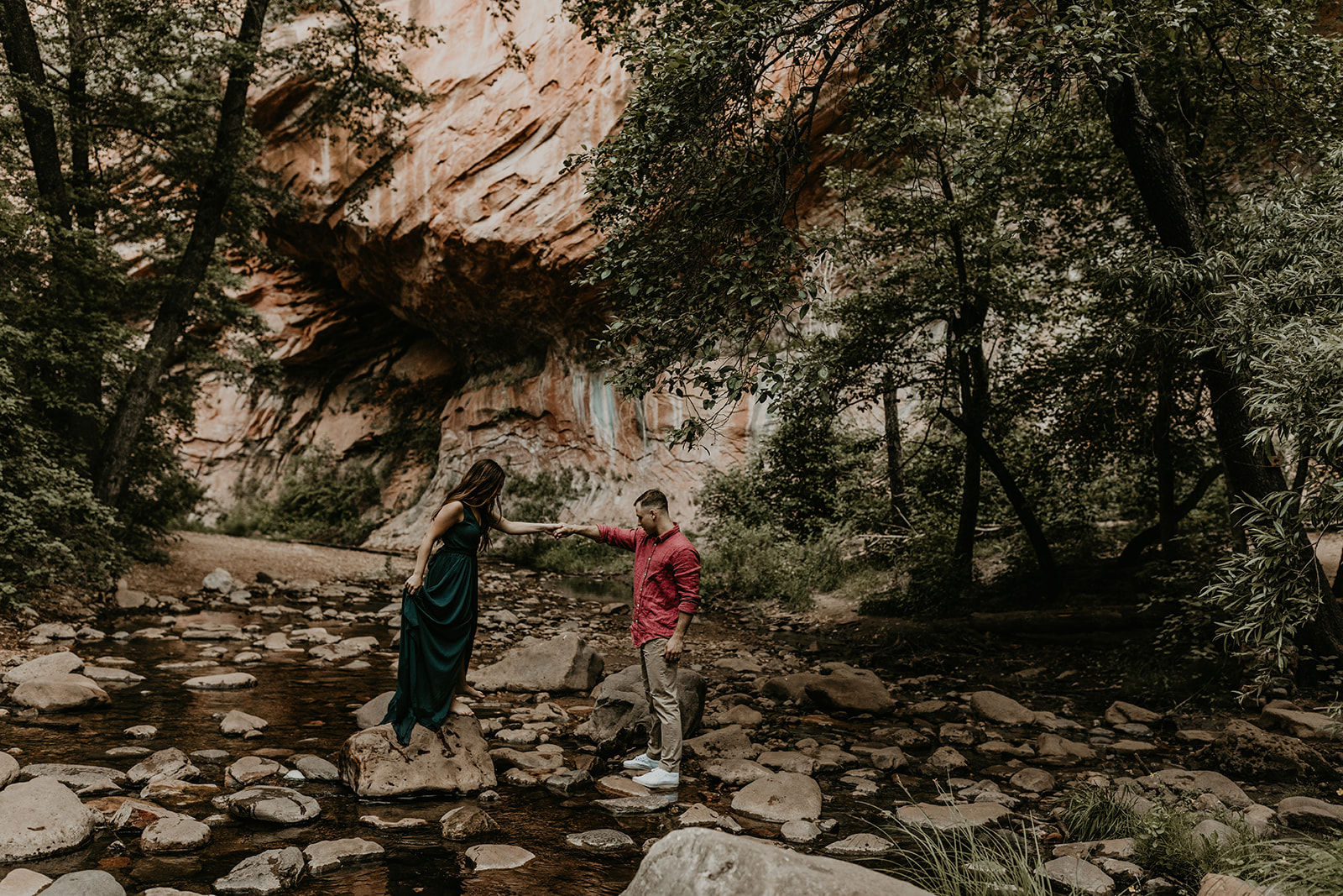 beautiful couple pose in the Arizona nature during their West Fork Trail engagement photoshoot