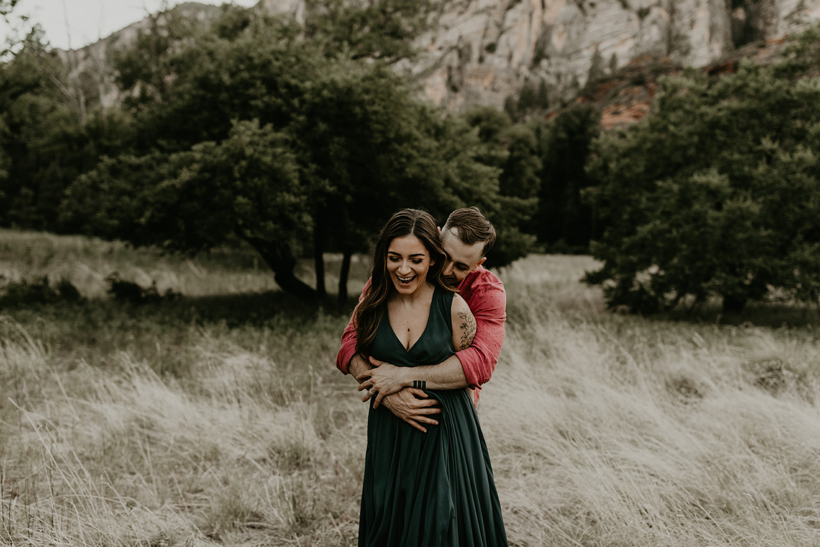 beautiful couple pose with the Arizona nature in the background