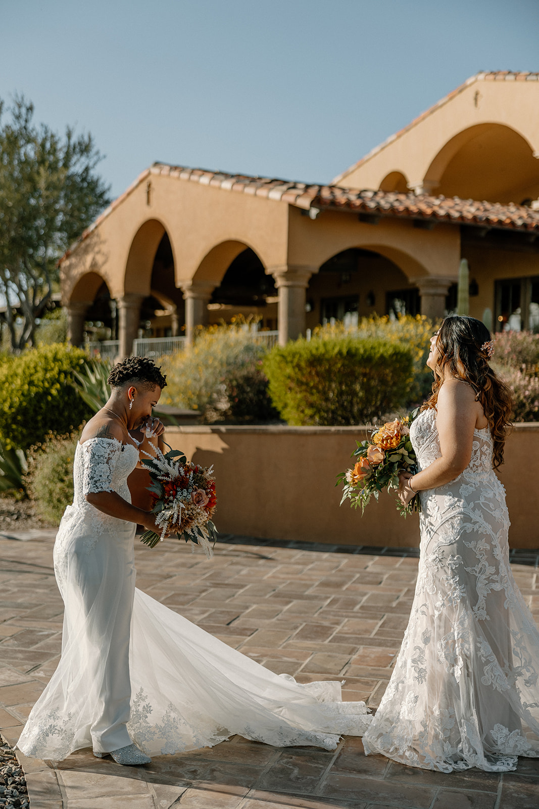 stunning brides pose together during their dreamy blackstone country club wedding