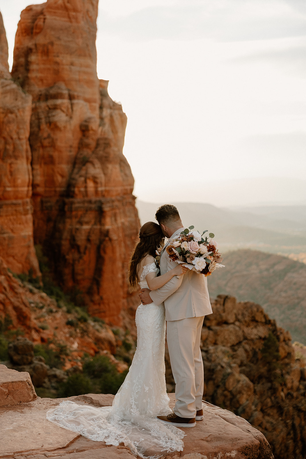 bride and groom wrap up their wedding day with Arizona desert bride and groom photos