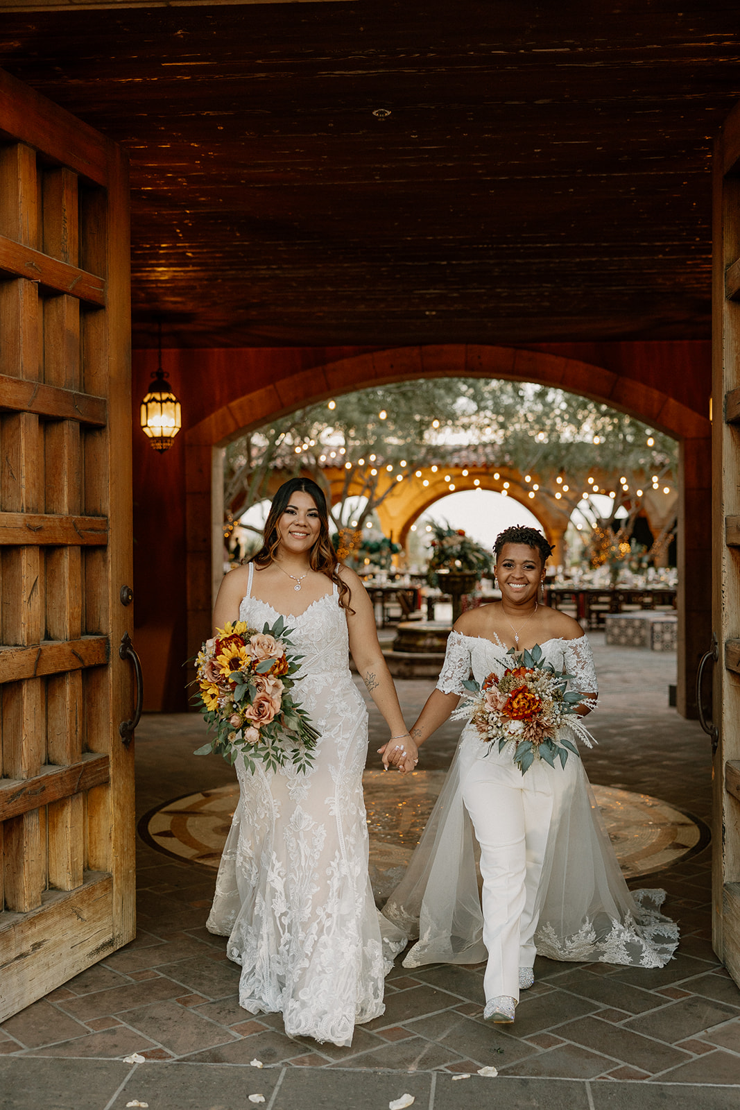 stunning brides pose together during their dreamy blackstone country club wedding