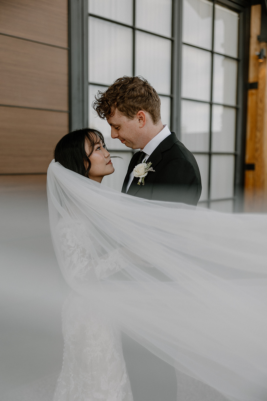 bride and groom start their wedding day timeline with first look photos