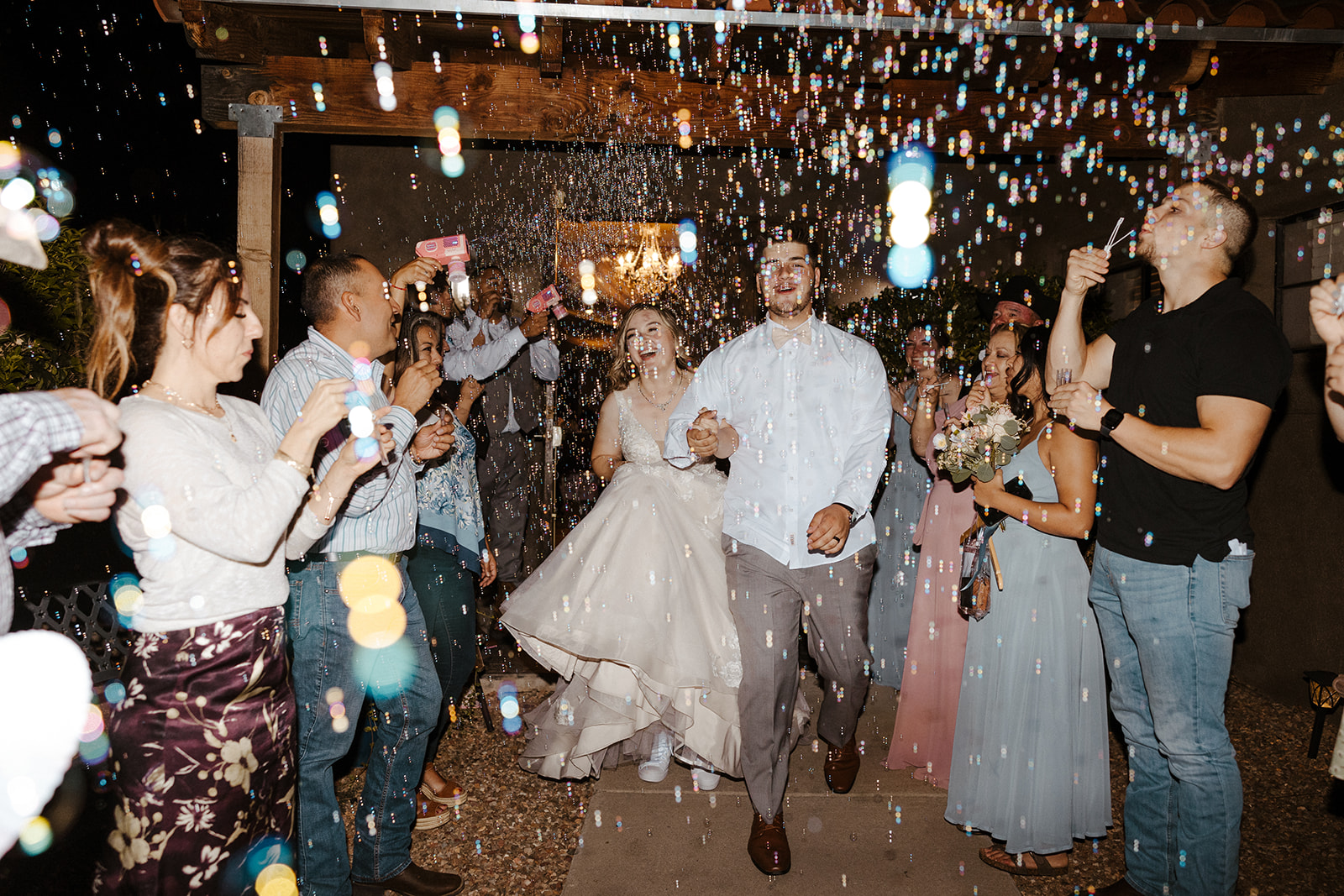 photo of bride and groom at their wedding reception. Include ample time in your wedding day timeline for your wedding reception photos