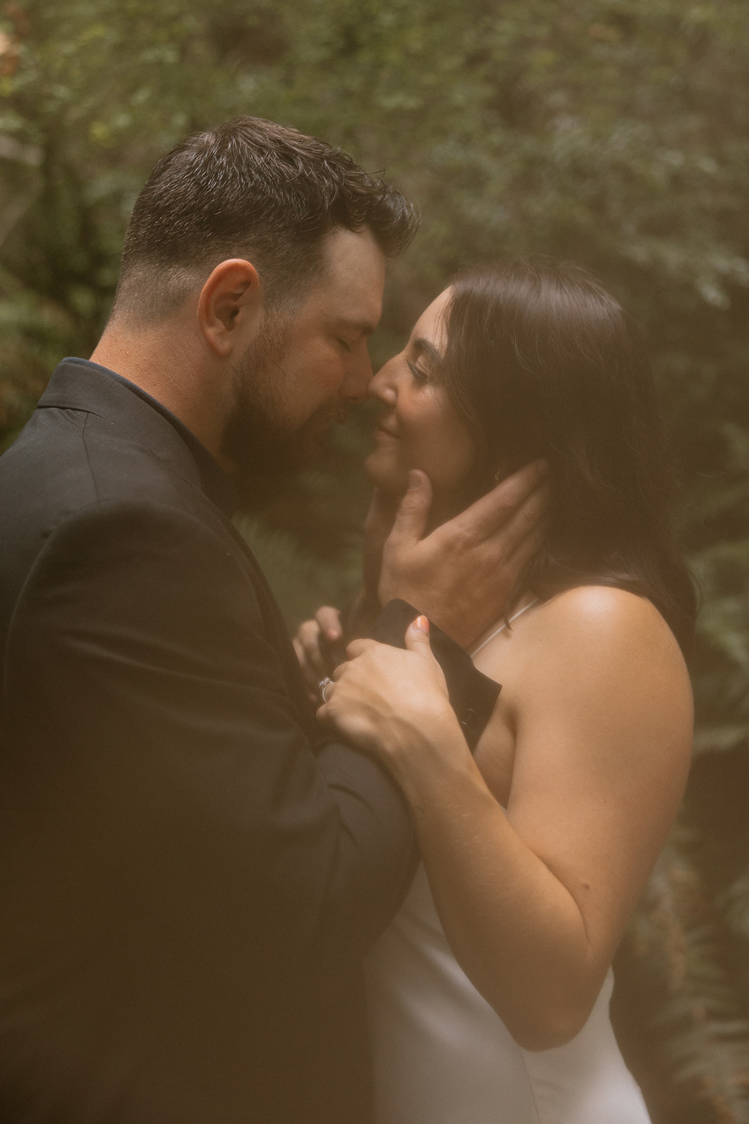 couple share an intimate moment during their PNW wedding anniversary