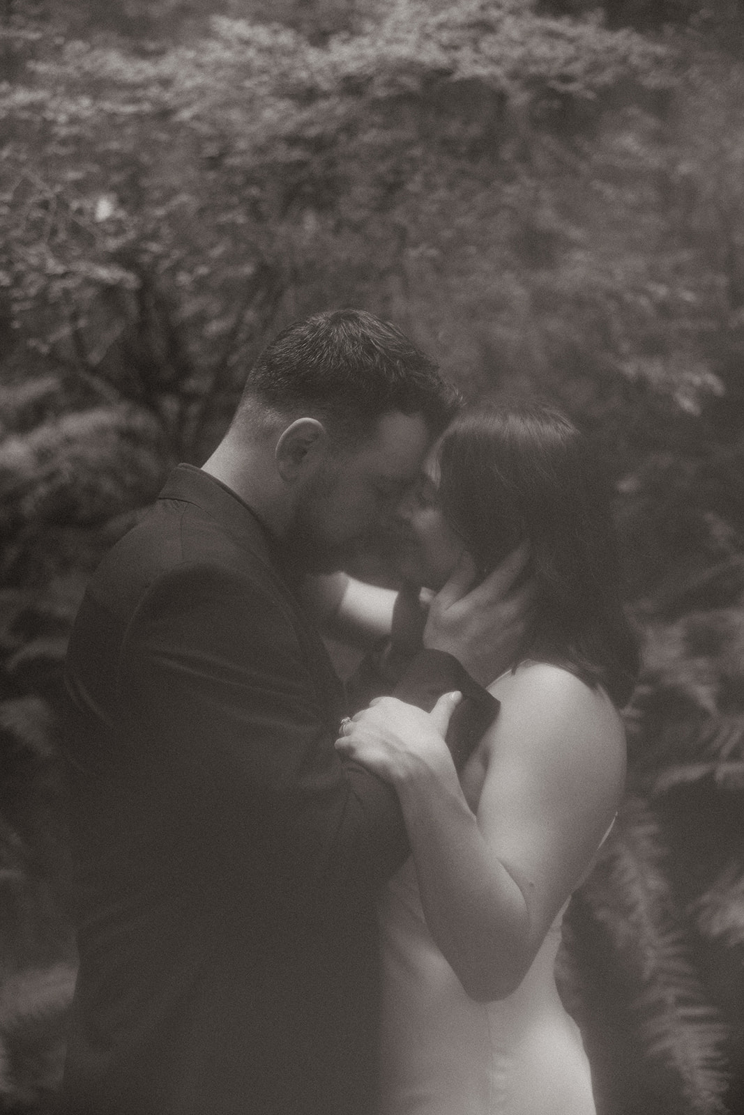 stunning couple pose in the PNW forest together during their wedding anniversary photoshoot with Kali M Photos!