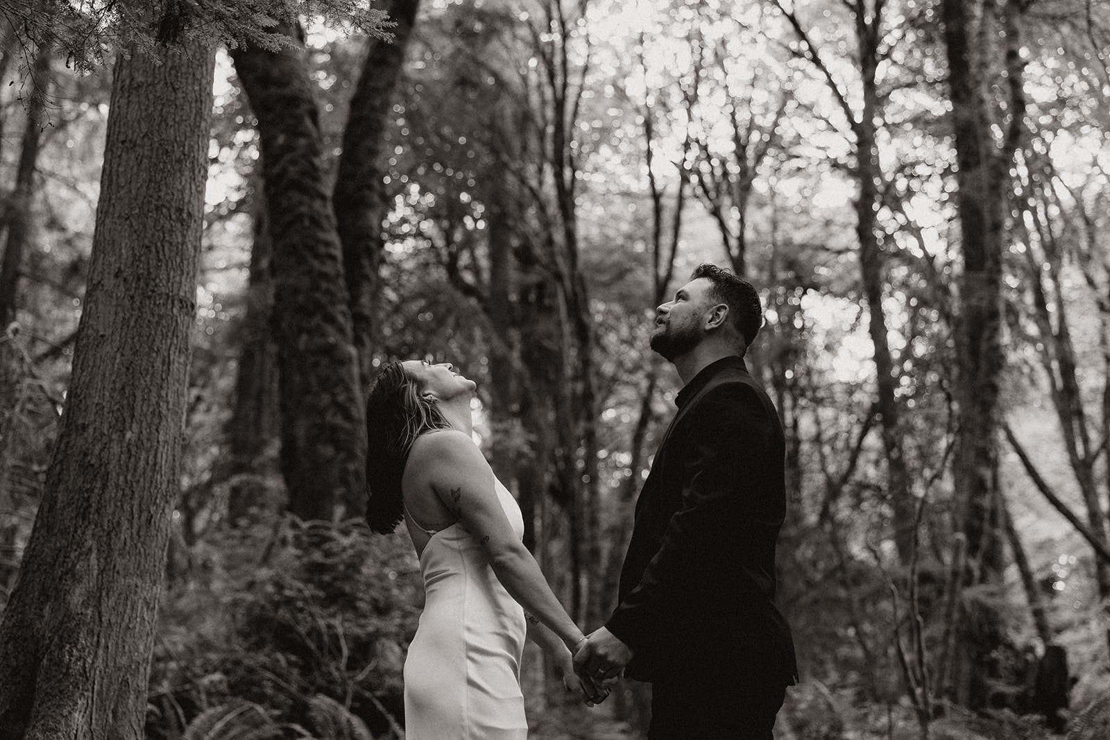 couple share an intimate moment during their PNW wedding anniversary