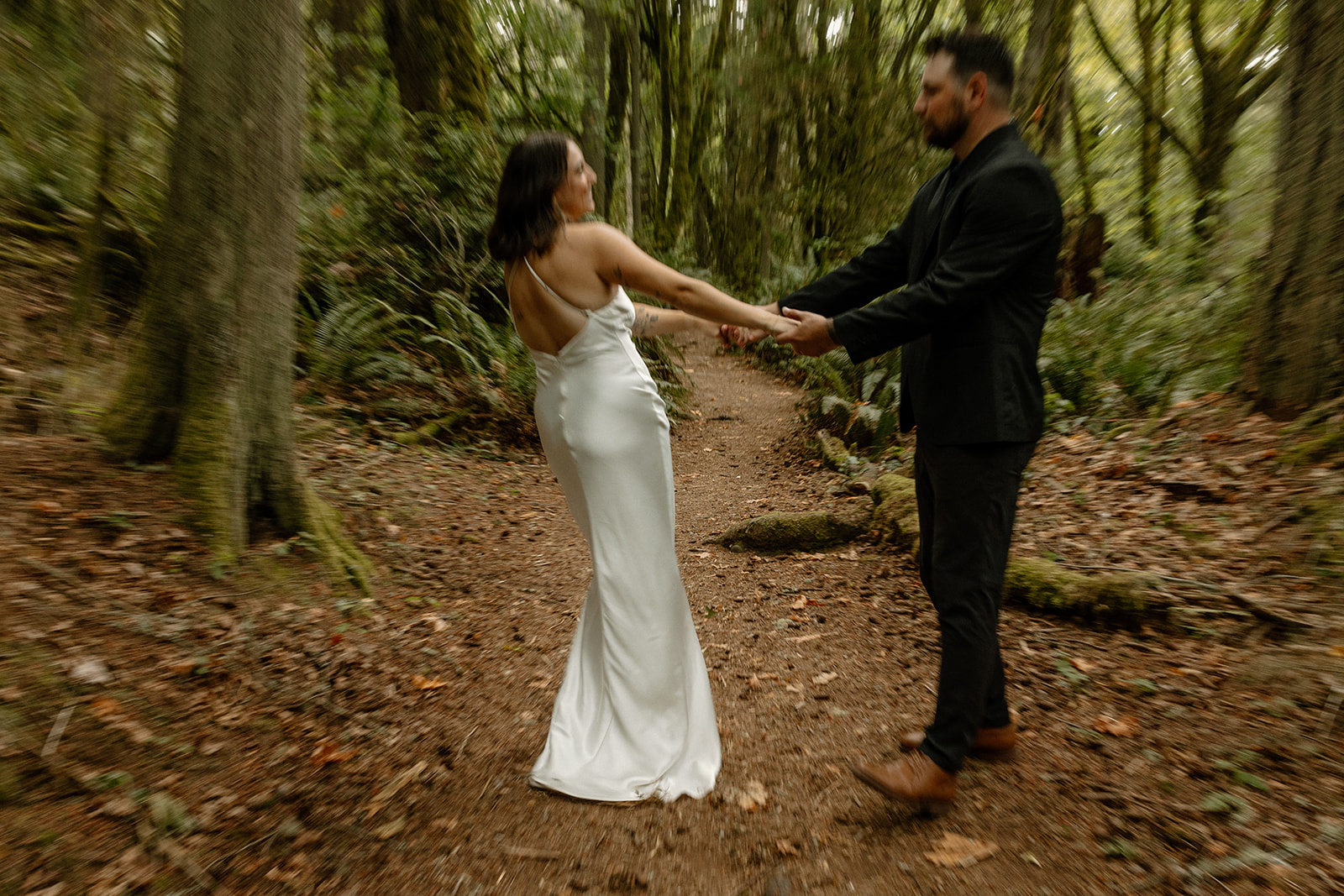 couple share an intimate moment during their PNW wedding anniversary