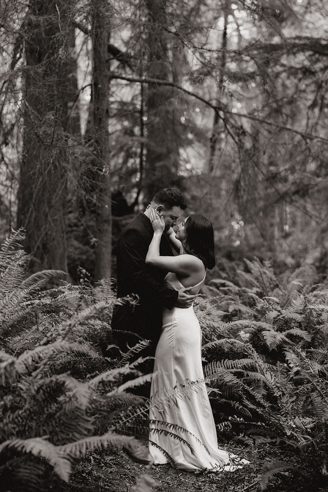 couple share an intimate moment during their PNW wedding anniversary