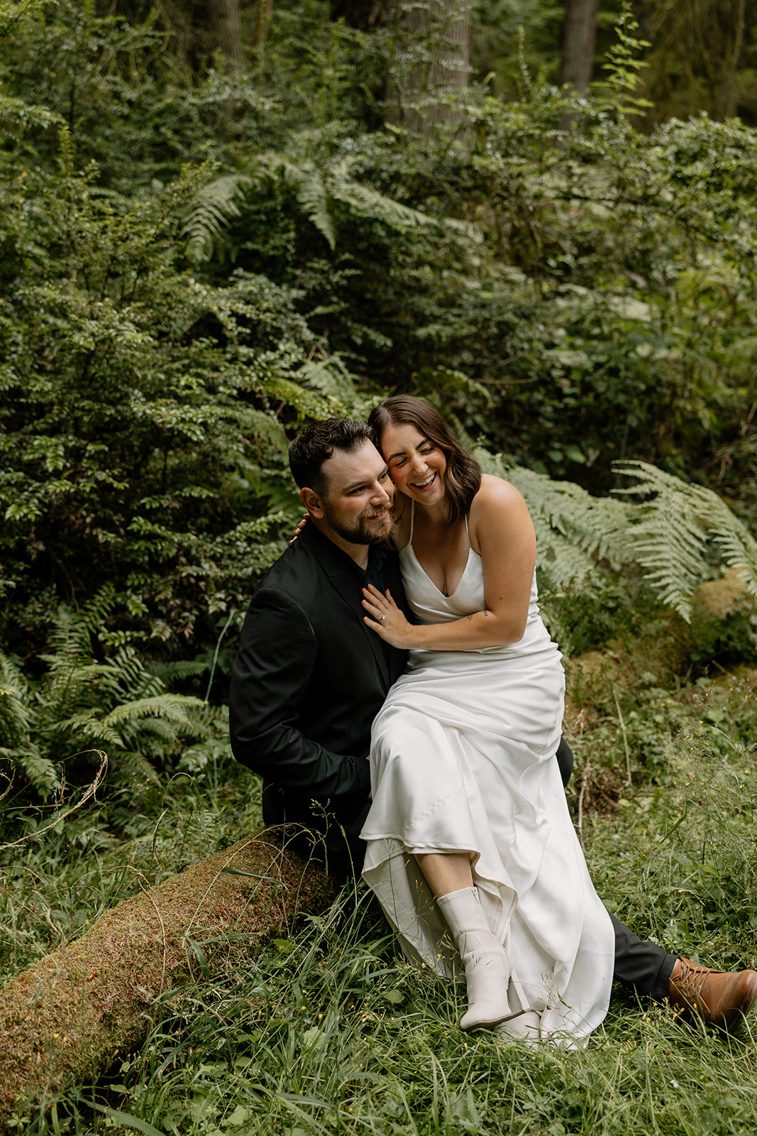 stunning couple pose in the PNW forest together during their wedding anniversary photoshoot with Kali M Photos!