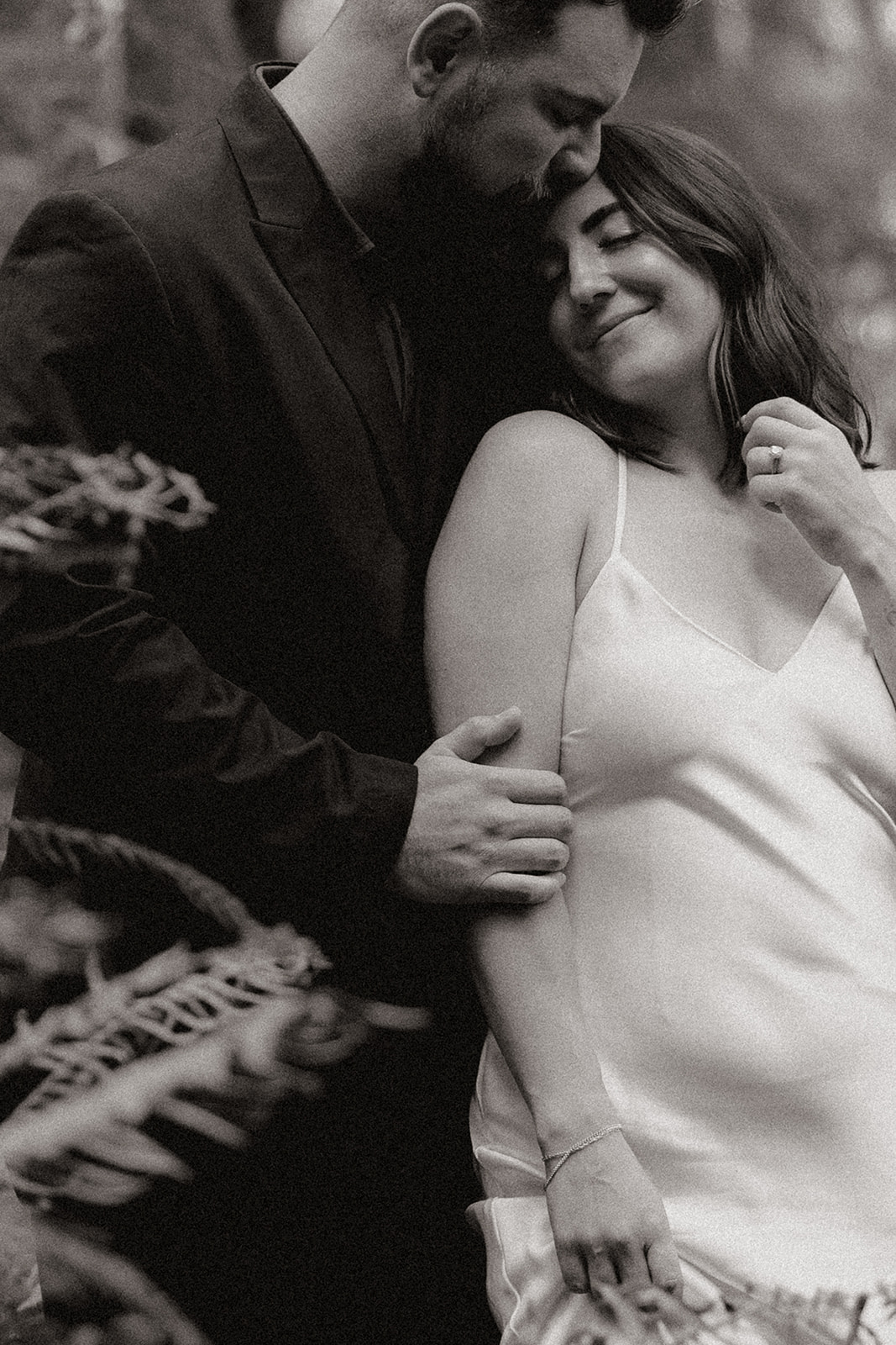 couple share an intimate moment during their PNW wedding anniversary