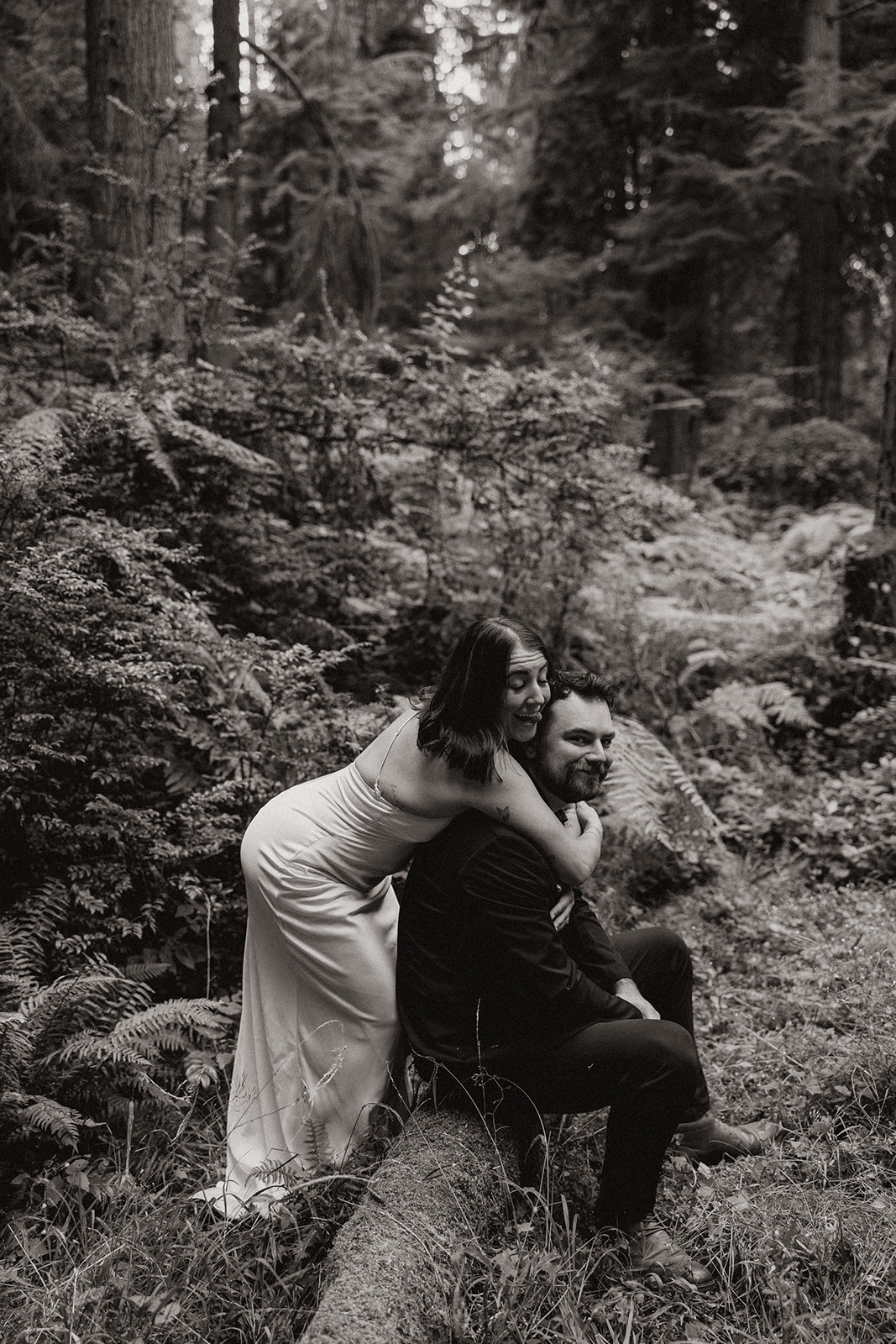 stunning couple pose in the PNW forest together during their wedding anniversary photoshoot with Kali M Photos!