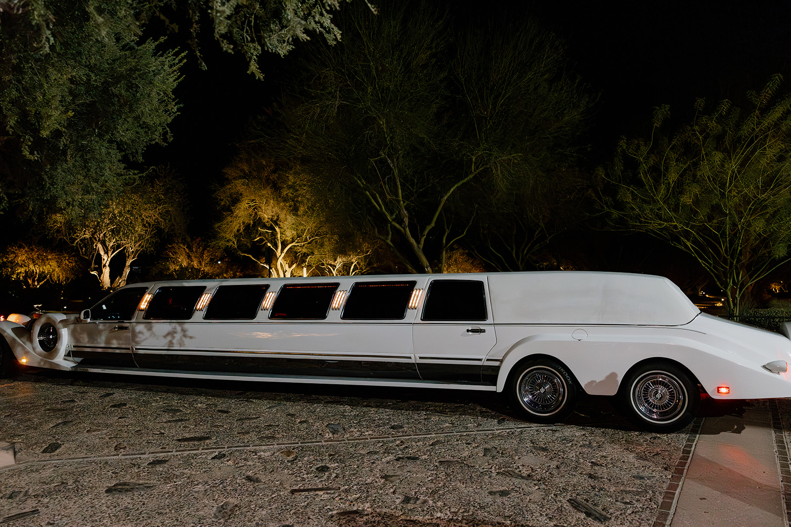 unique limo awaits to take away the beautiful brides from their blackstone country club wedding