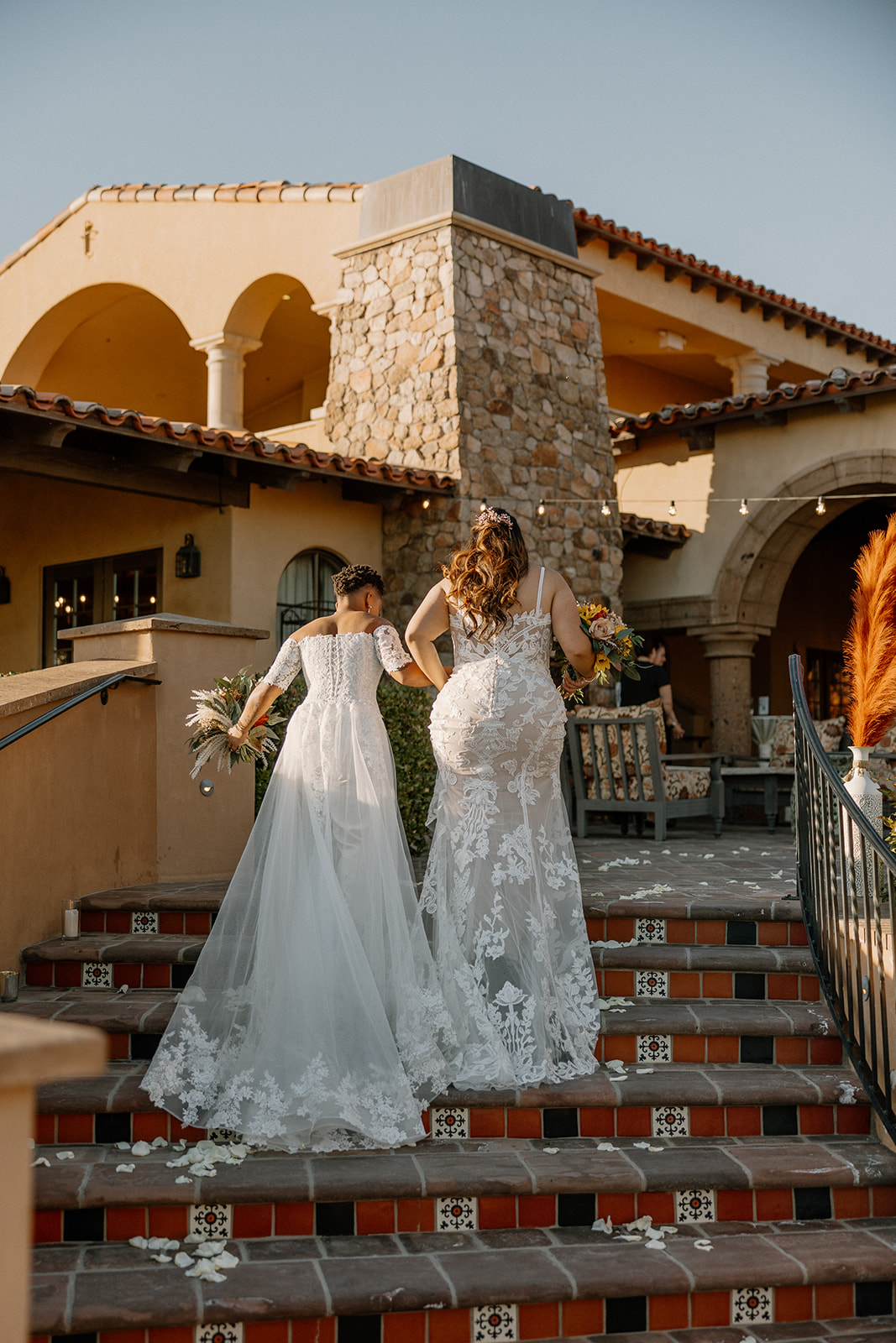 stunning brides pose together during their dreamy blackstone country club wedding