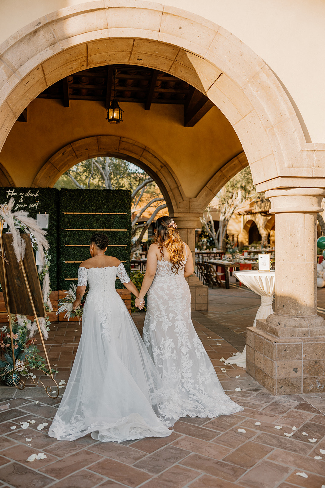 stunning brides pose together during their dreamy blackstone country club wedding