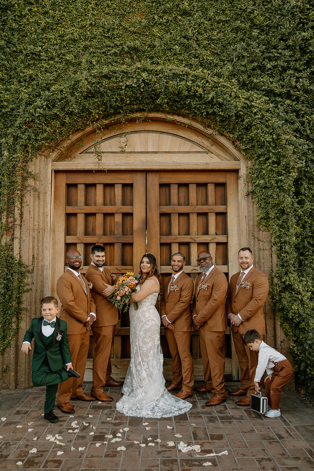 bride poses with their wedding party