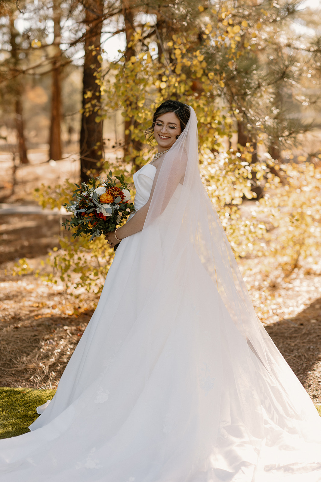 bride poses in the Arizona nature