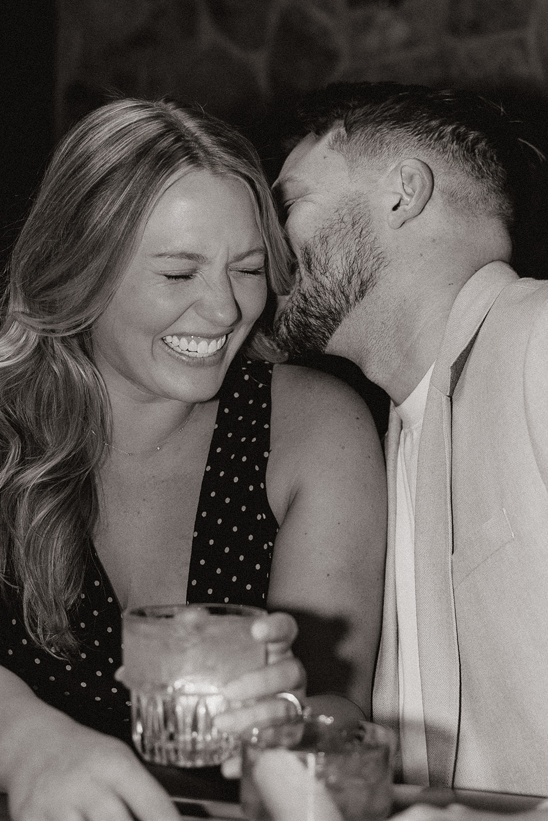 gorgeous couple takes their engagement photoshoot indoors to their favorite bar