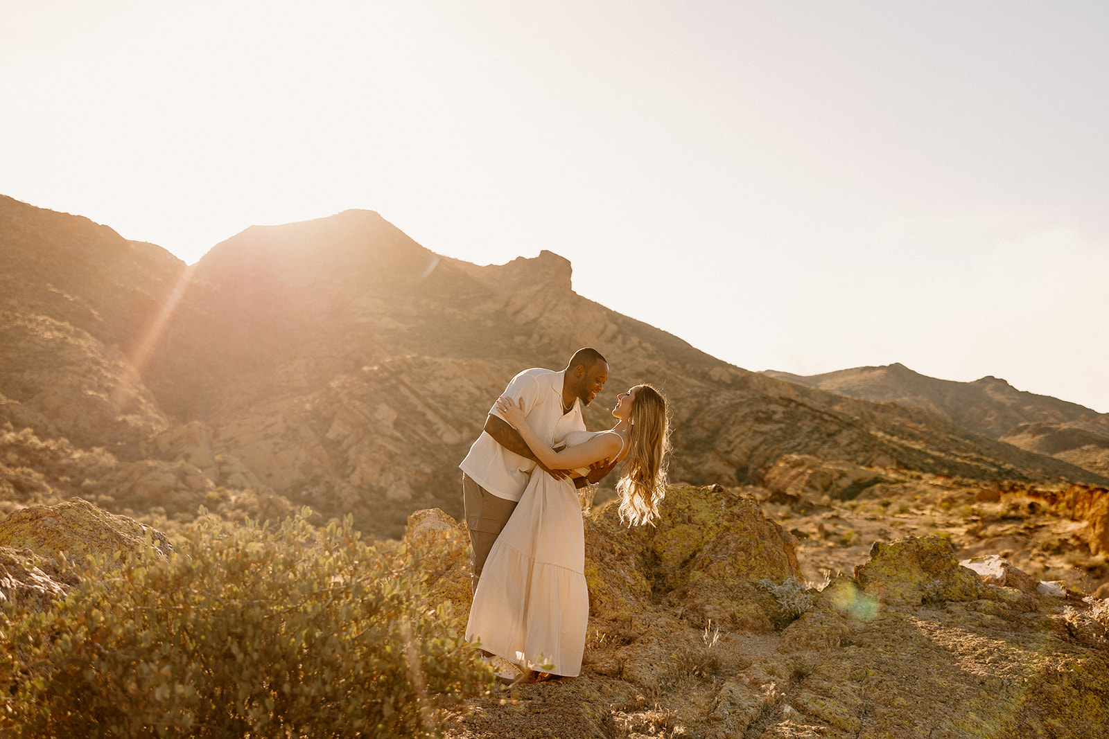 beautiful couple pose together in the Arizona desert