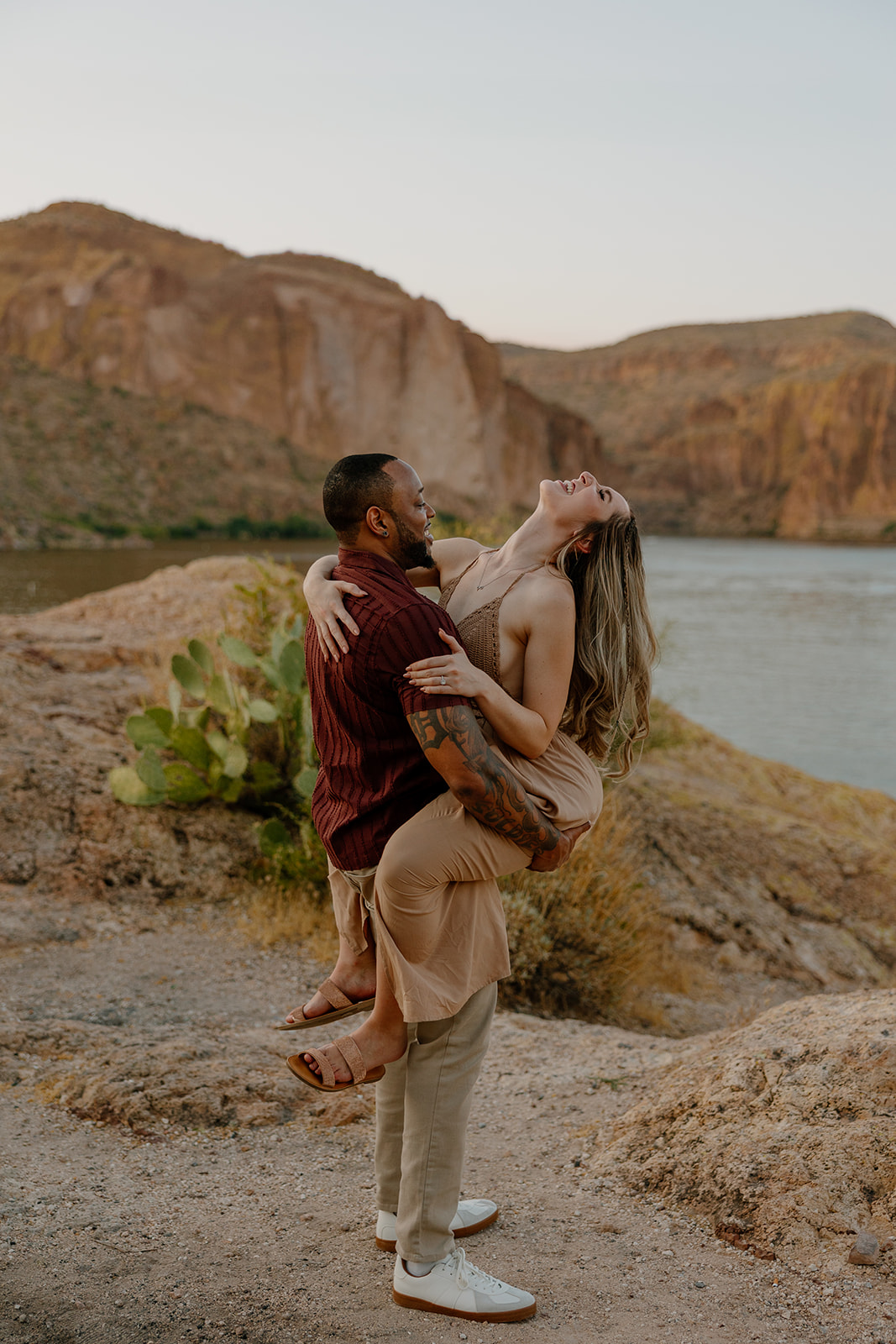 couple share intimate moments during their Arizona engagement photoshoot