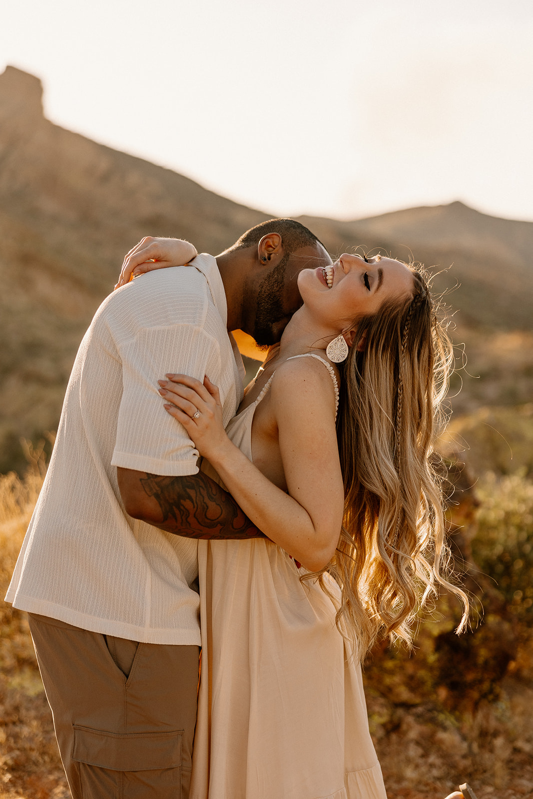 beautiful couple pose together in the Arizona desert