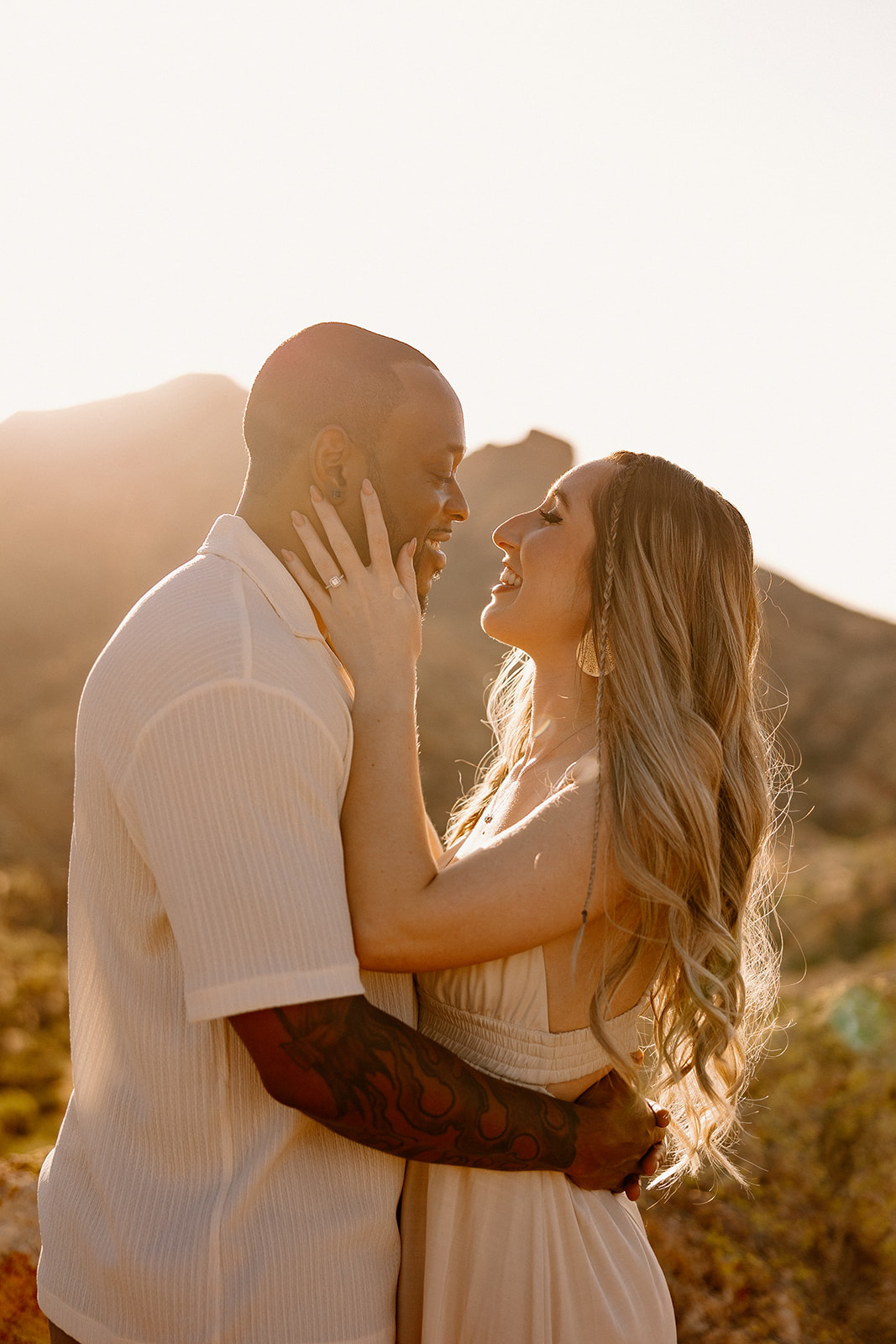 couple take photos in the Arizona mountains