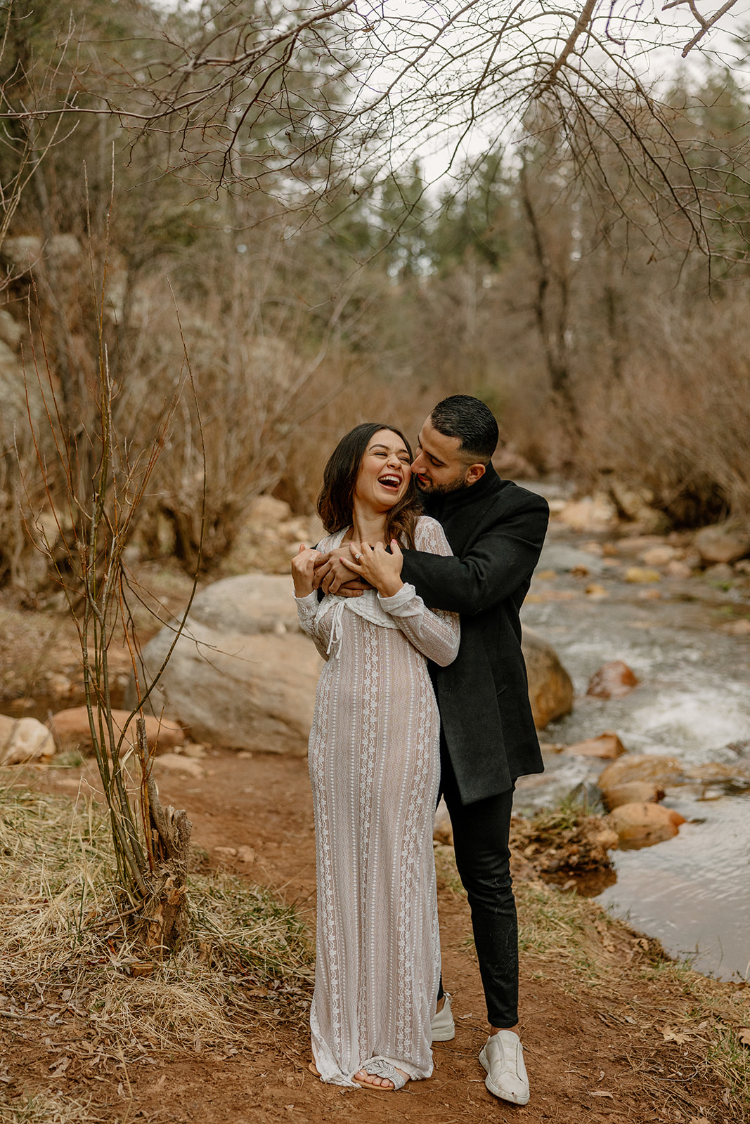 beautiful couple pose together in the Arizona wilderness